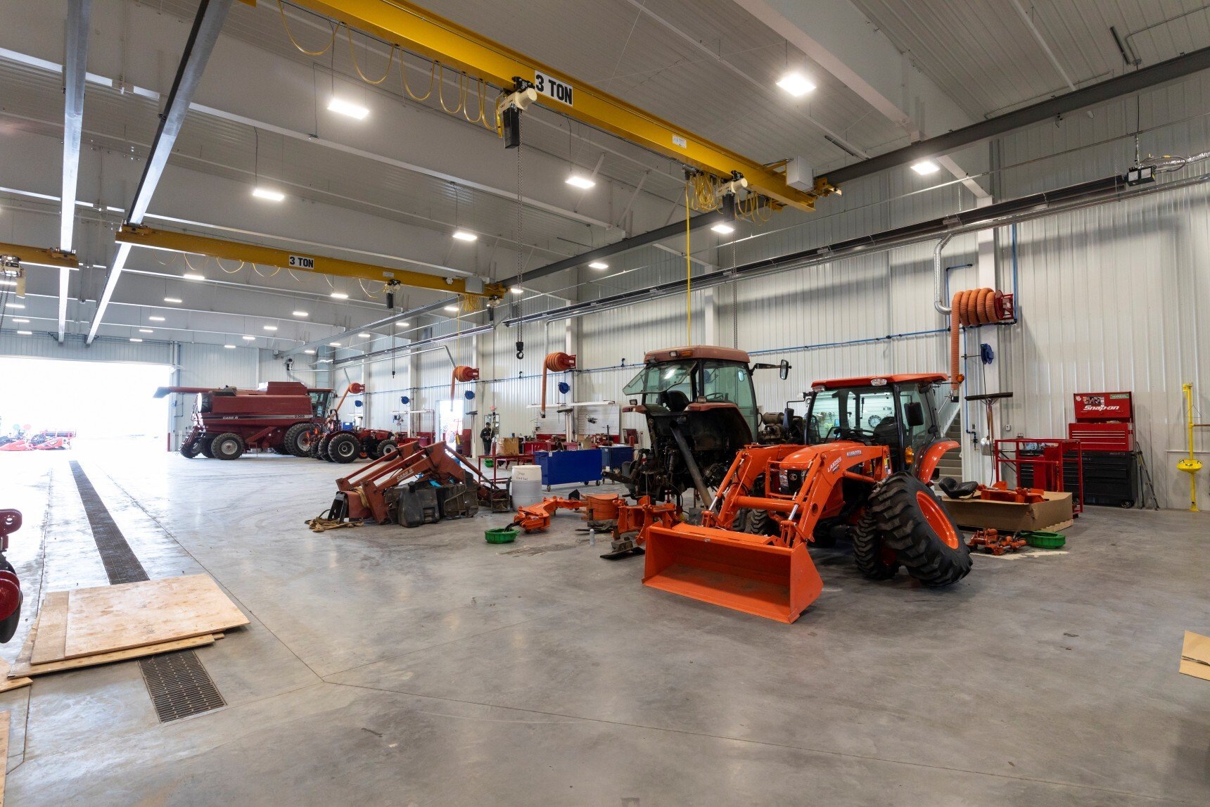 Interior of service shop with overhead crane and equipment bays, constructed by Rice Companies