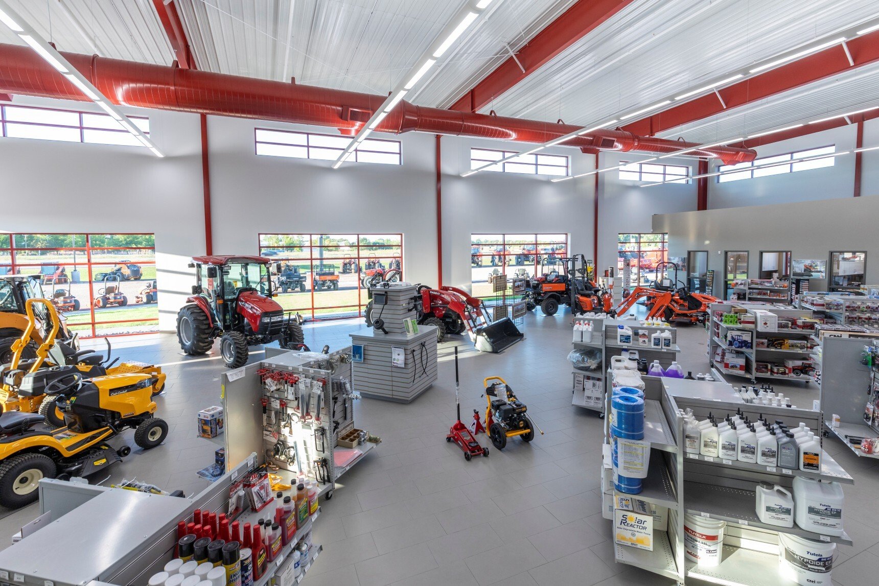 Interior of equipment dealership showroom with product displays, constructed by Rice Companies