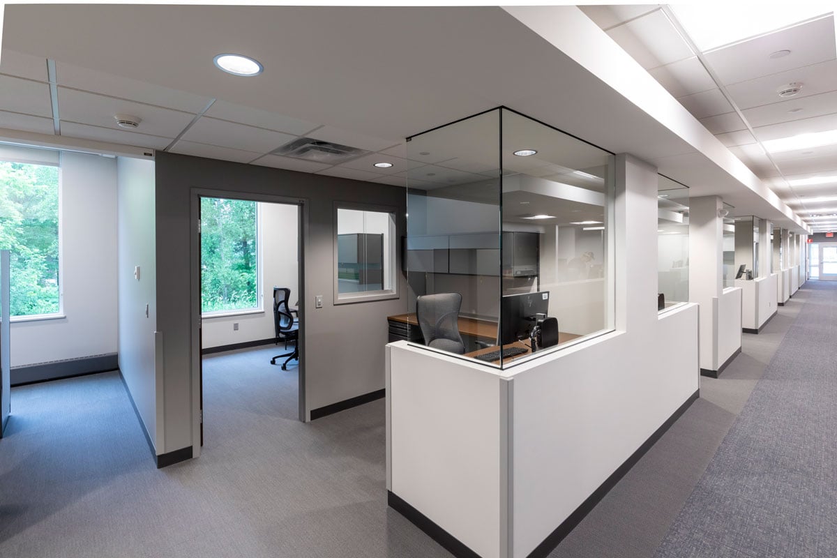 Interior of medical clinic showing exam rooms and staff workstations, constructed by Rice Companies