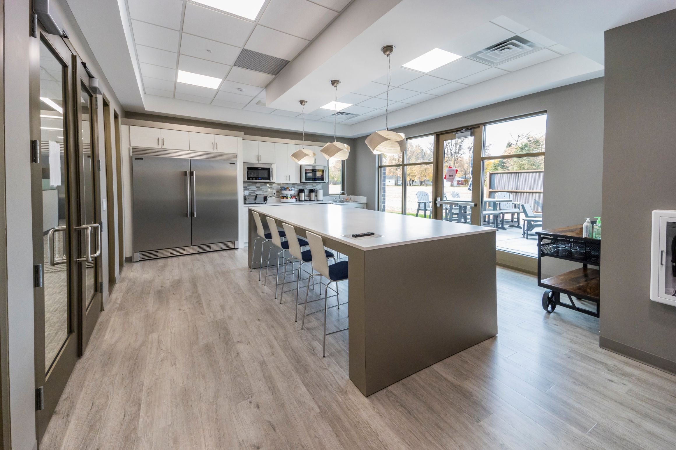 Interior of corporate office showing employee break room and collaborative workspace, constructed by Rice Companies