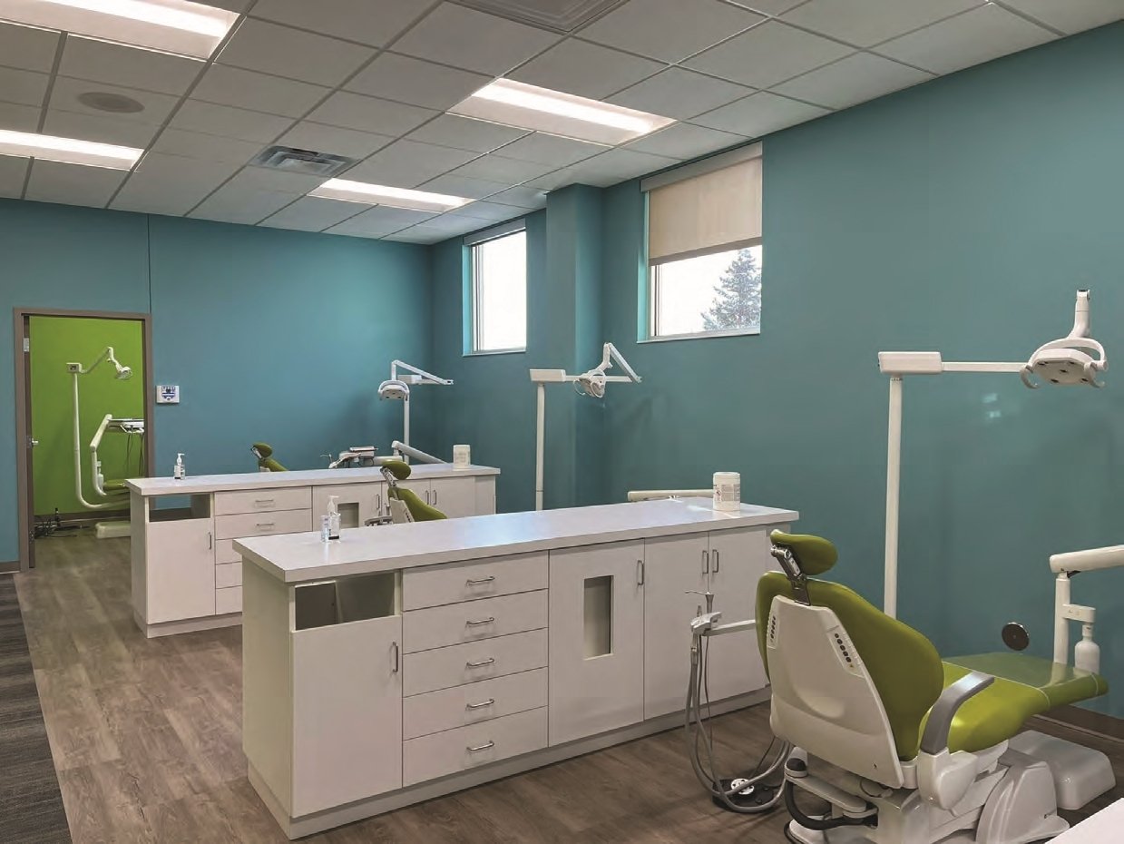 Interior of pediatric dental clinic showing treatment rooms and clinical workstations, constructed by Rice Companies