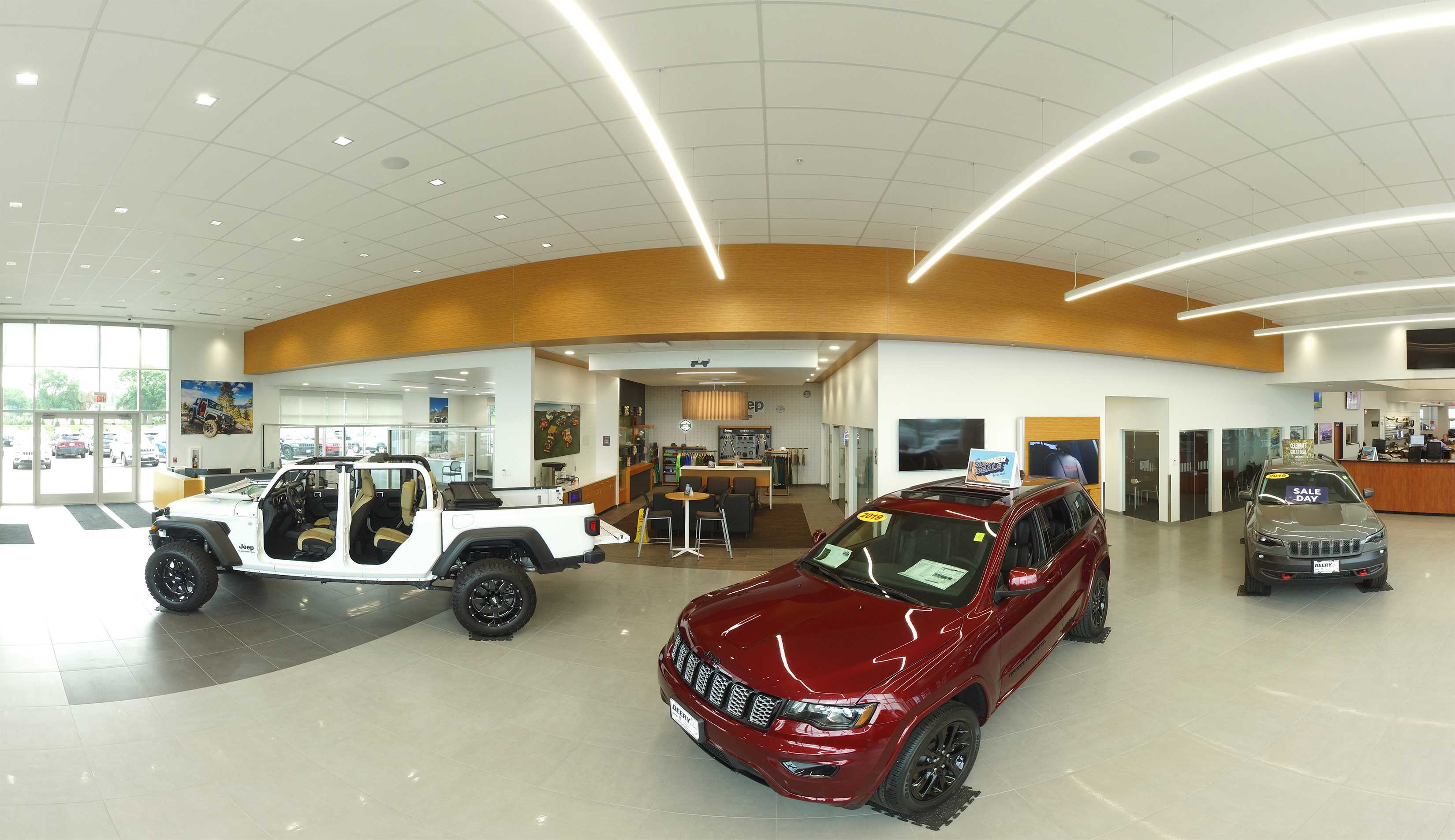Deery Brothers automotive showroom interior with vehicle displays built by Rice Companies