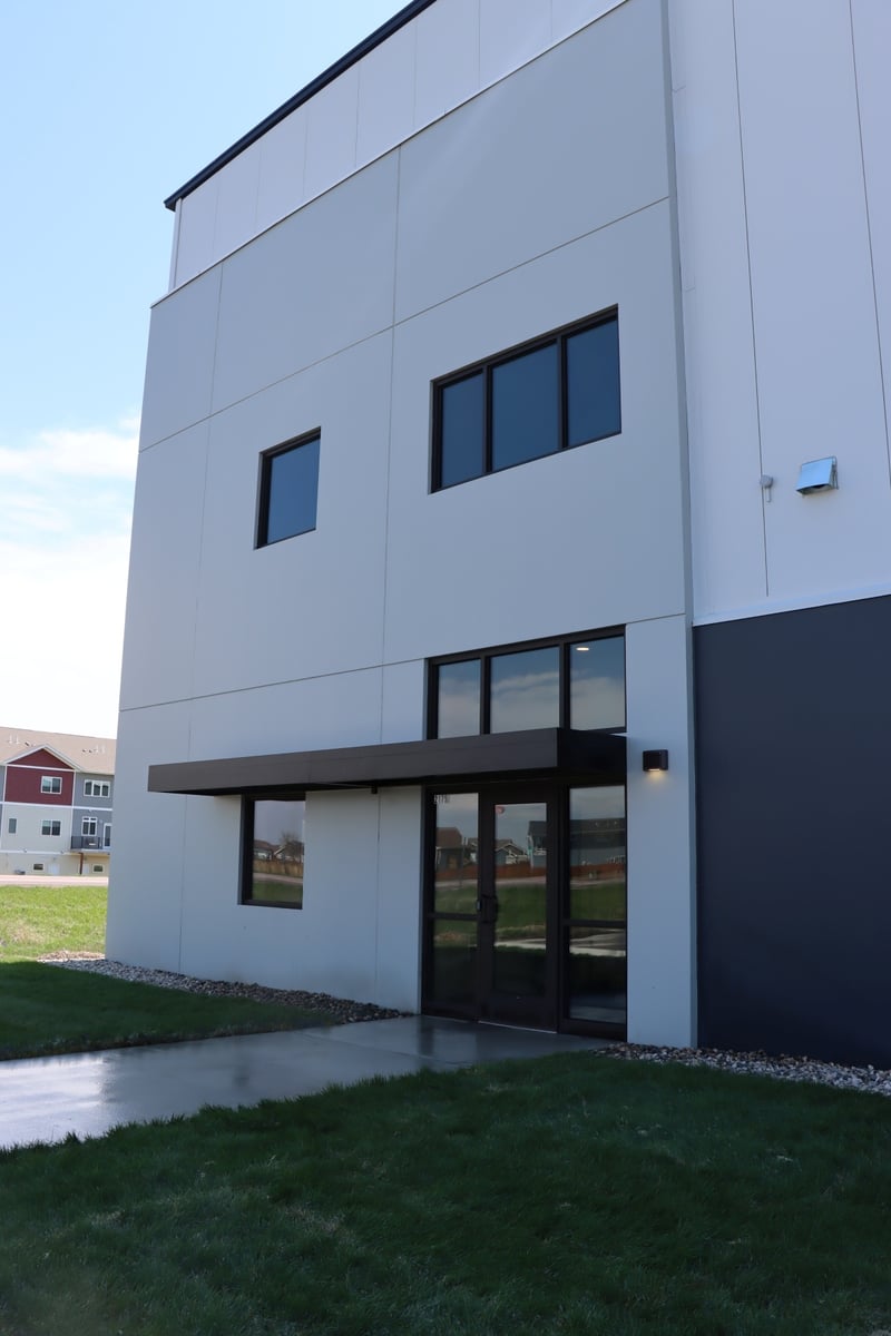 Exterior of warehouse facility showing office entrance and facade, constructed by Rice Companies