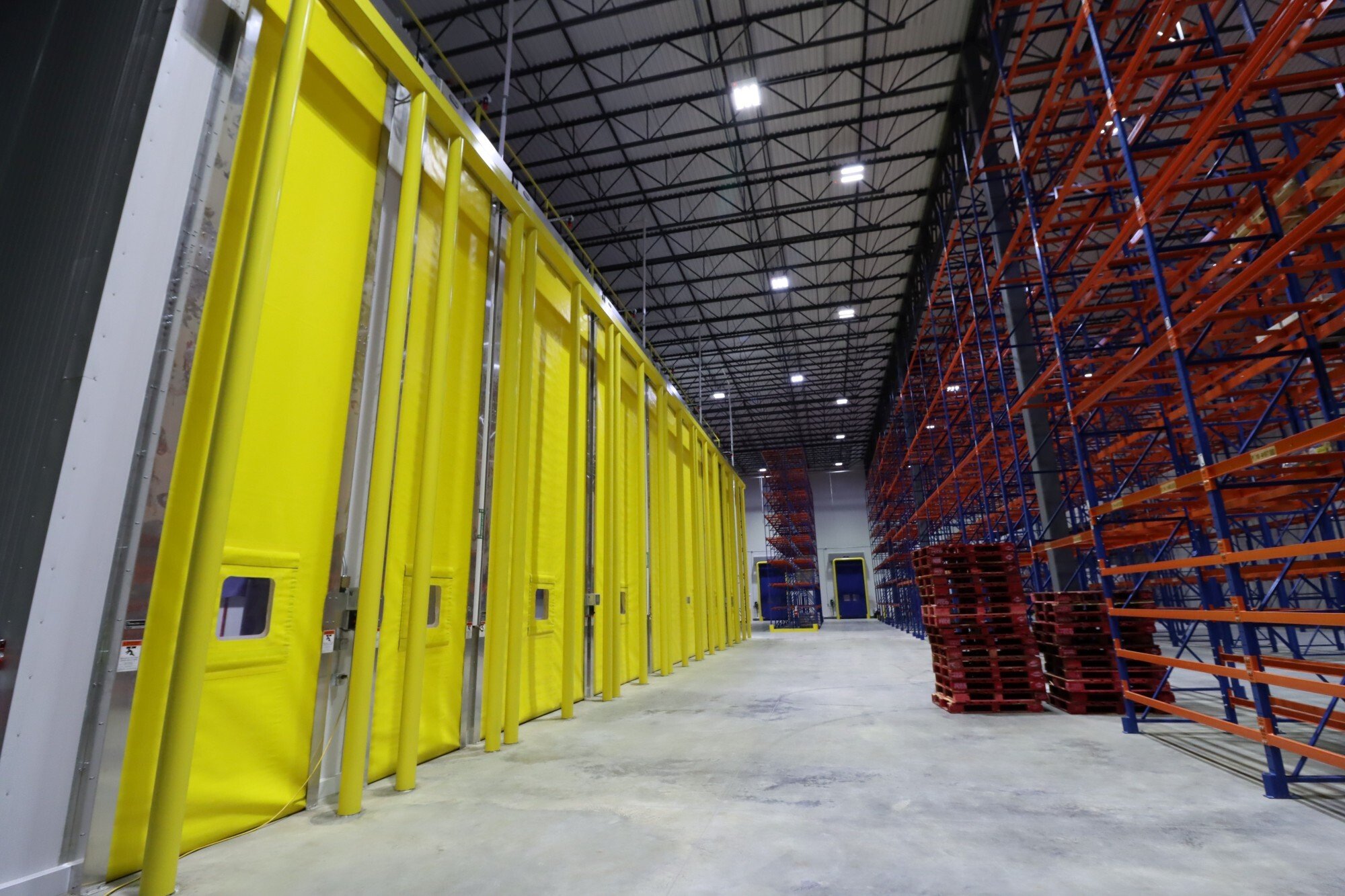 Storage warehouse interior with high-density pallet racking constructed by Rice Companies